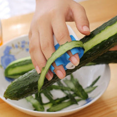 Finger Held Peeler