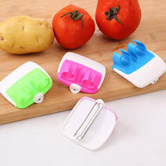 Finger Held Peeler