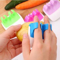 Finger Held Peeler
